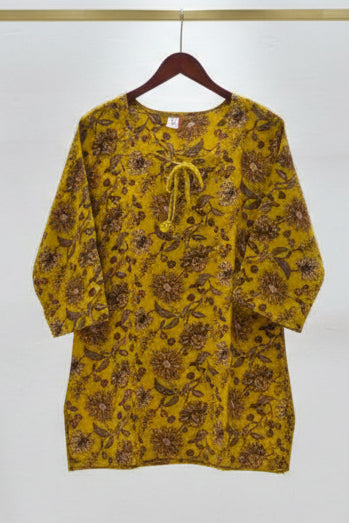 Yellow top with brown floral pattern